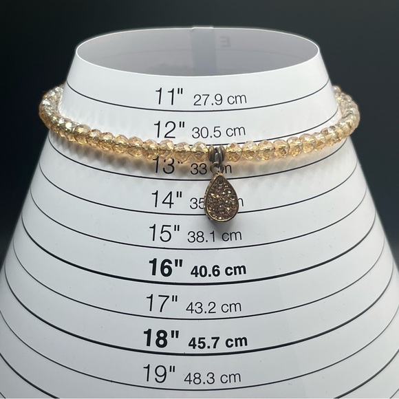 Modern light amber colored crystal choker with a teardrop rhinestone pendant. - Picture 4 of 9